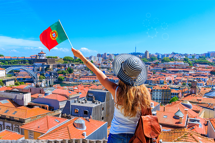 A woman proudly holds a Portuguese flag in front of a bustling city, showcasing her patriotism and love for her country
